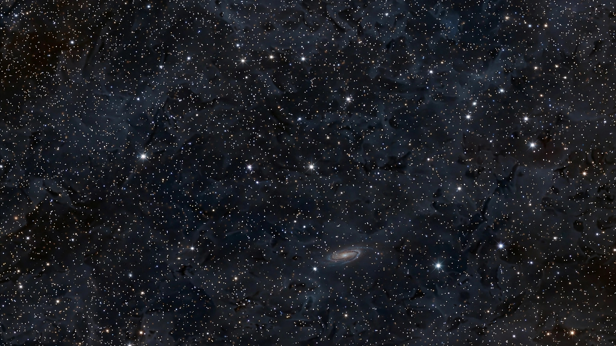 Outer space with stars and a distant planet